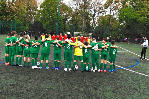 Omonia Youth FC U12 White observing a minute's silence